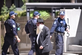 Alleged Bondi gunman charged with 15 murders as funerals of victims begin