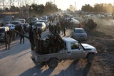 Syria tightens grip after Kurdish pullback, says IS prisoners escape